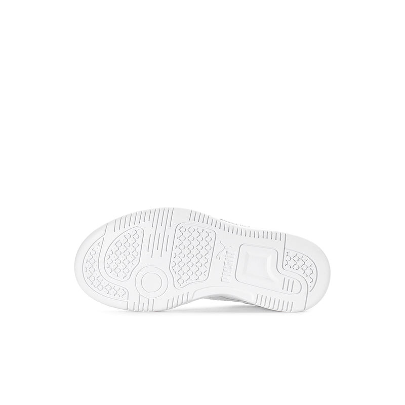 Kids white sneaker outsole view with traction tread pattern