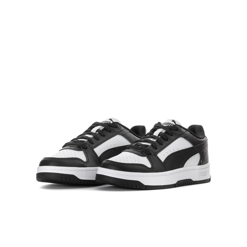 Youth low-top lace-up sneakers in black and white with side panel stripes and PUMA logo