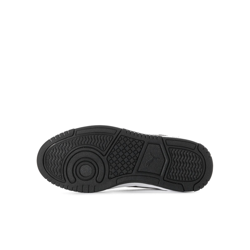 Youth sneaker outsole and heel tread in dark rubber with textured pattern