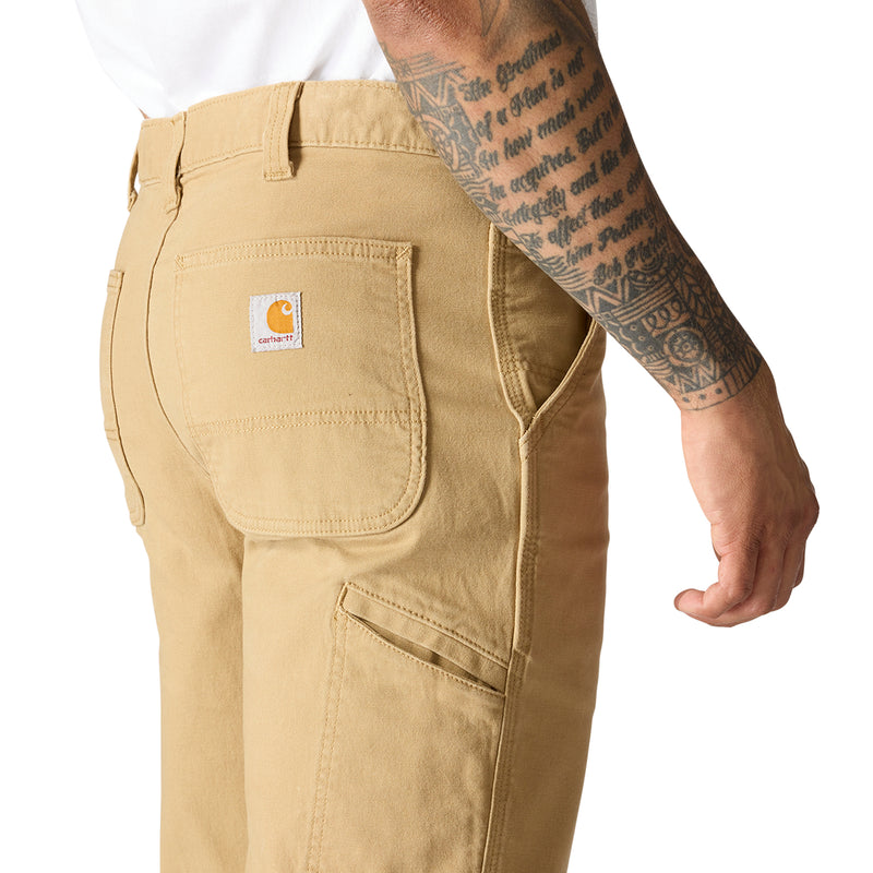 Dark khaki dungaree pants with back pocket and stitched cargo-style panel