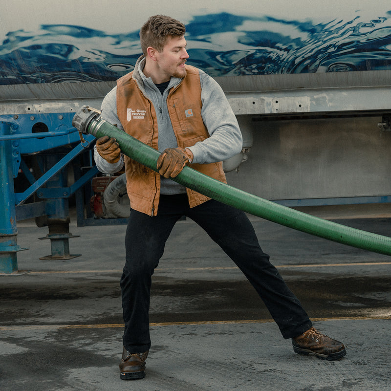 Dark straight work pants with belt loops and front seam detail