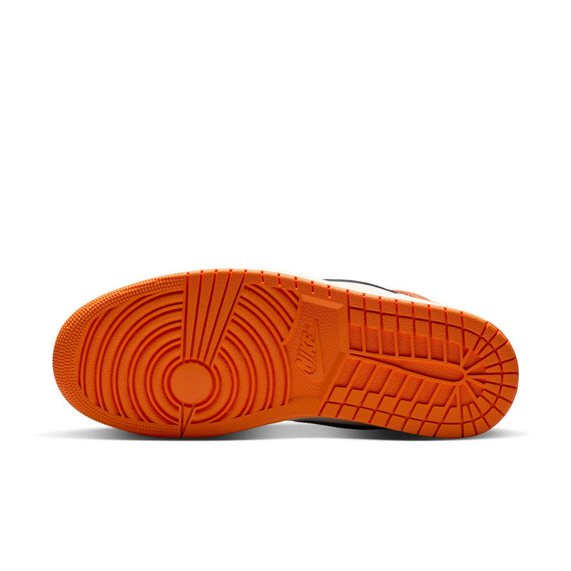 Men's high-top sneaker outsole, orange rubber tread sole underside.