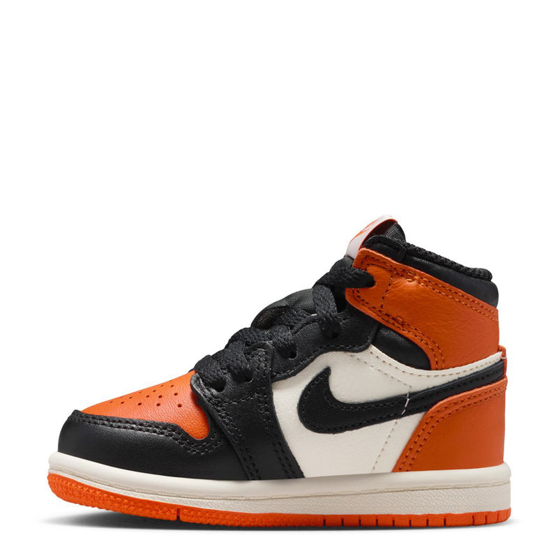 Toddler high-top sneakers with orange toe panels, black laces, and white Nike swoosh