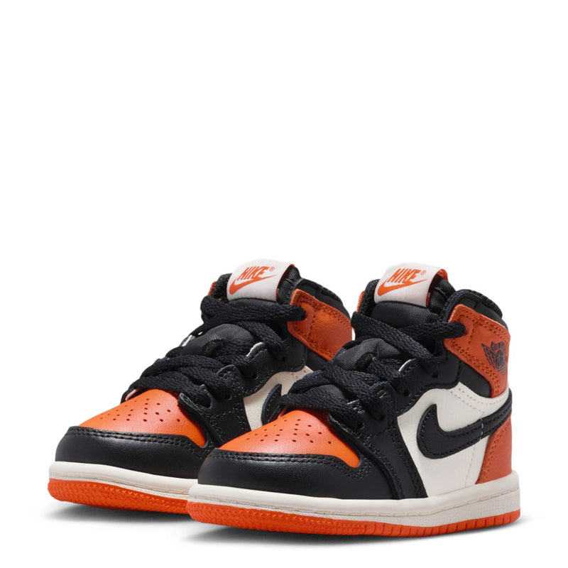 Pair of toddler high-top sneakers in black, orange, and white with Nike logos