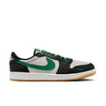 Men's low-top sneakers in black, white, and green with lace-up and gum sole.