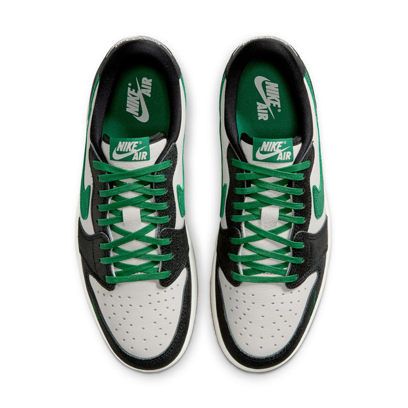 Pair of low-top sneakers with Nike Air tongue label and green lace-up.