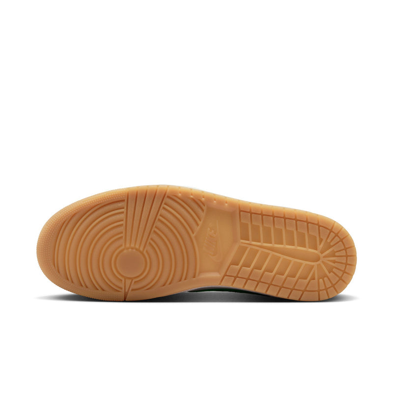 Low-top sneaker outsole with gum-brown tread for grip.