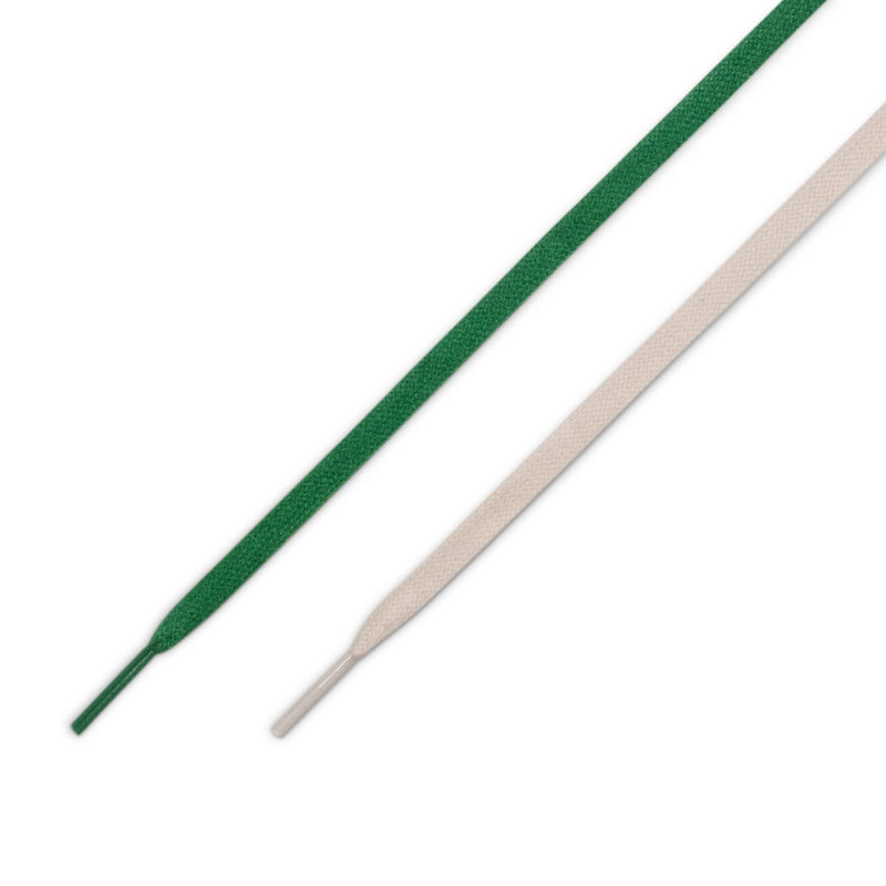 Green shoelaces for low-top sneakers with black eyelets.