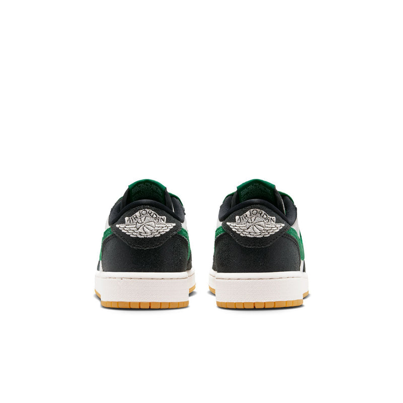 Youth low-top sneakers, rear view, black heel with green accents and white sole