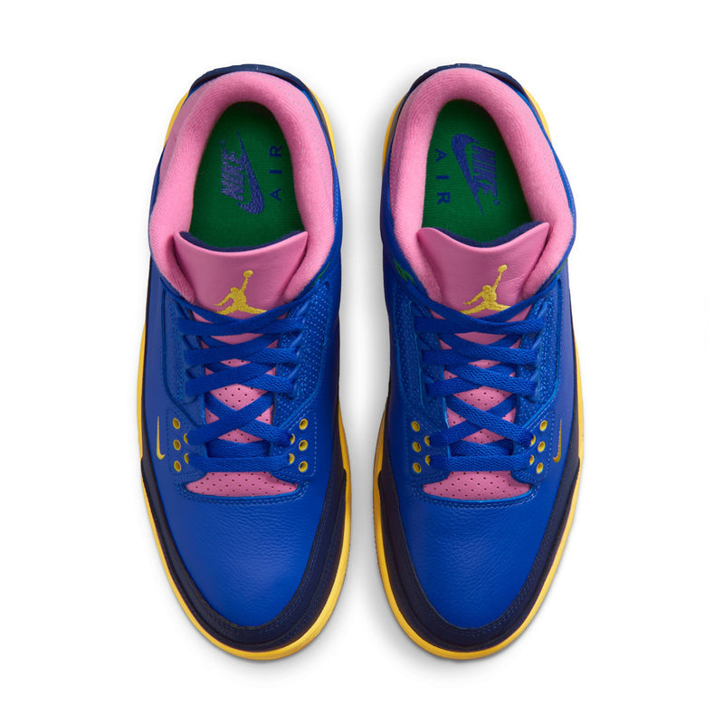 Pair of men's retro high-top sneakers with blue uppers, pink collars, yellow-trim soles.