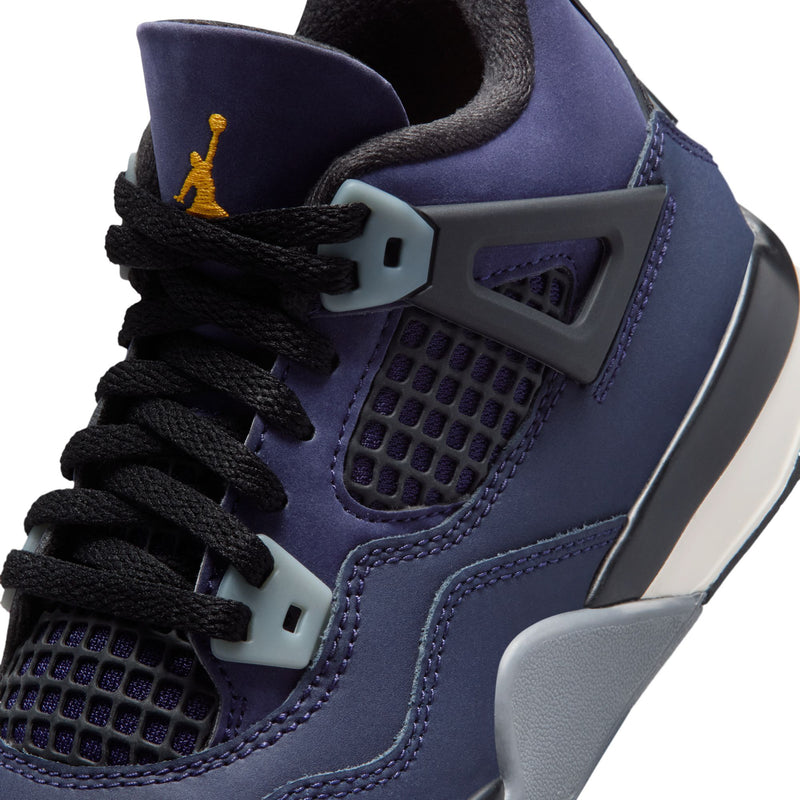 Close-up of kids’ purple sneaker with Air Jordan logo on tongue and lace eyelets