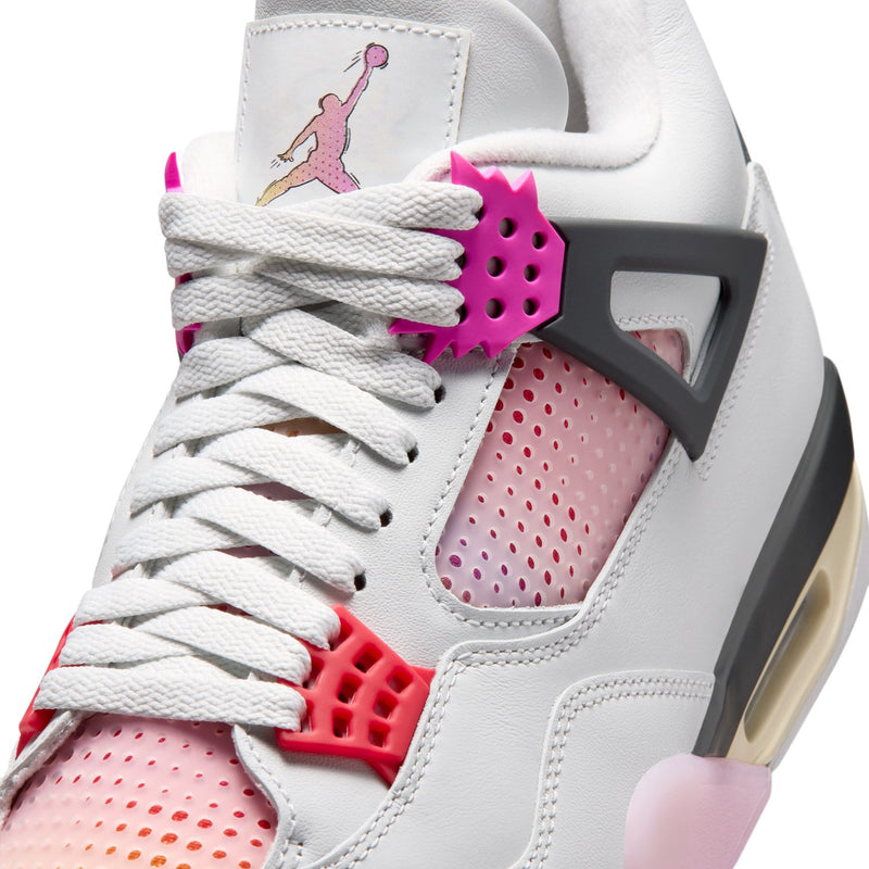Men's sneaker close-up: white laces, pink perforated side panel, Air Jordan tongue graphic