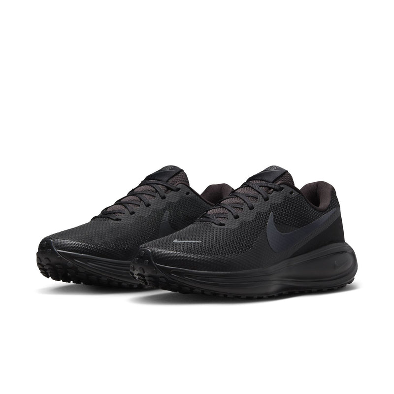Pair of women’s black lace-up running sneakers with textured uppers