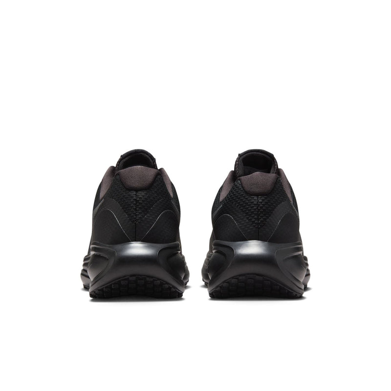 Women’s black running sneakers, rear view with cushioned heel and pull tab