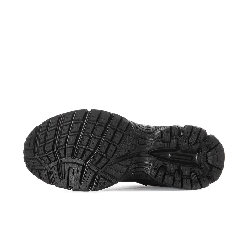 Black women's running shoes, outsole tread view with deep rubber traction pattern