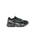 Black toddler sneakers with lace-up top and white logo-style side accents