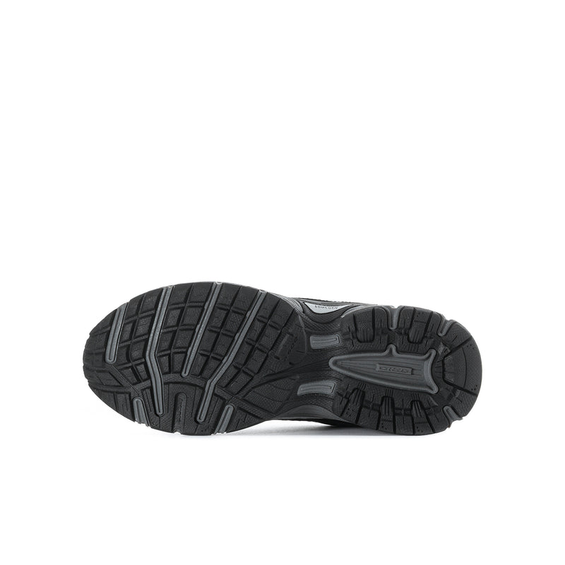 Youth black running shoe outsole with deep tread pattern