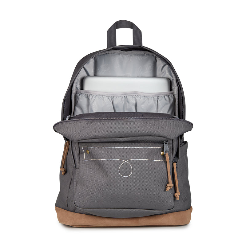 Gray JanSport backpack with front zip pocket and open top compartment, tan bottom panel.