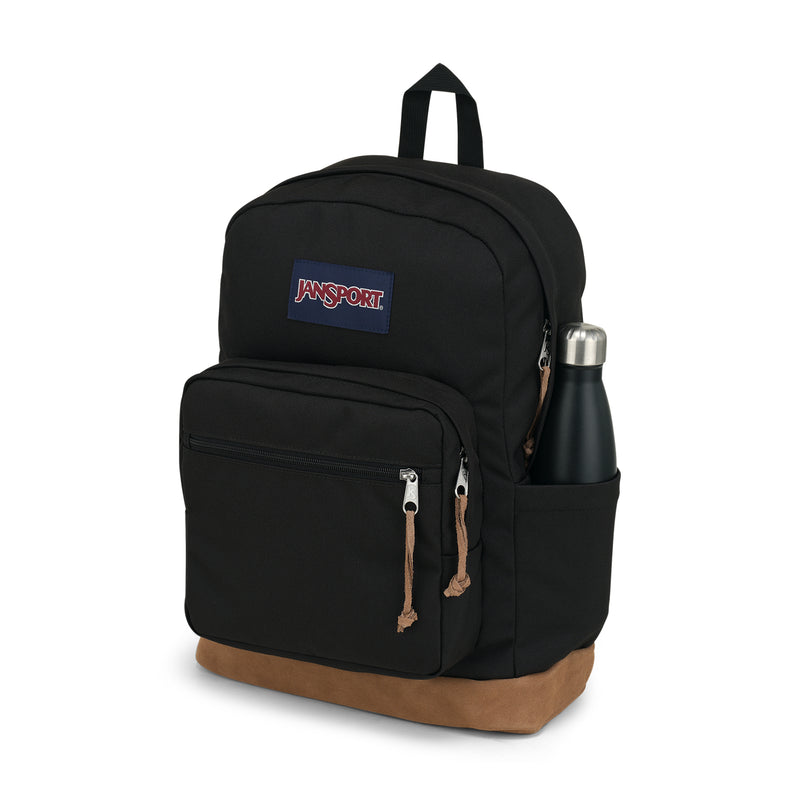 Black JanSport backpack with front compartments, zipper pulls, logo patch, tan base