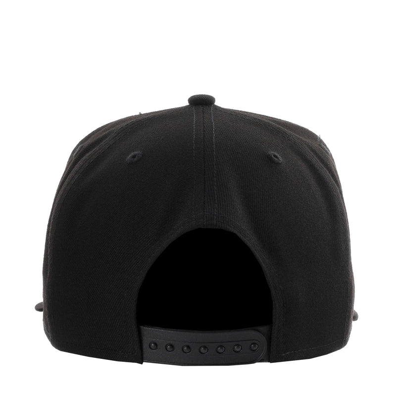Black snapback cap back with adjustable strap and metal eyelets