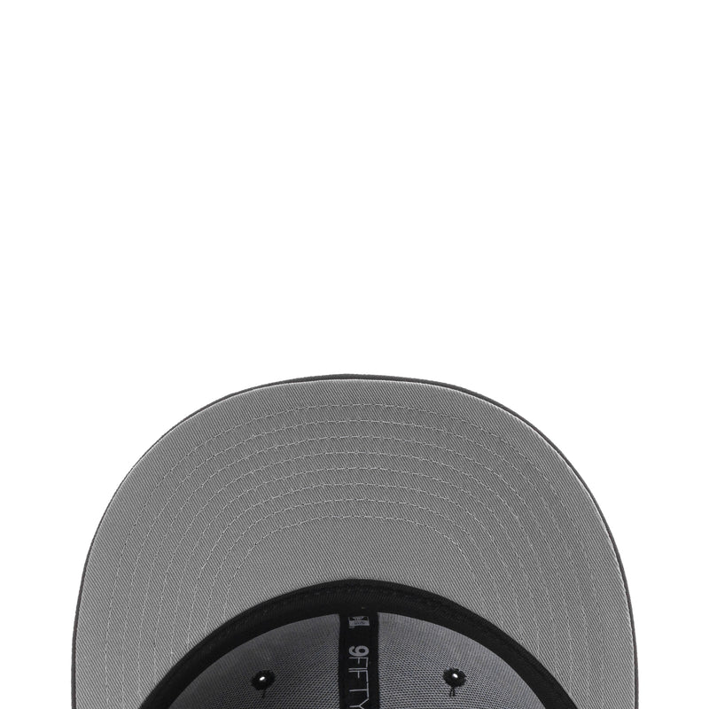 Gray underside of cap brim with black inner band and visible stitching