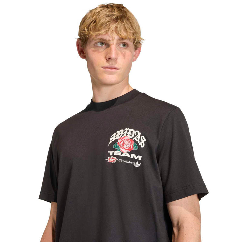 Men's black T-shirt close-up with rose and team logo graphic