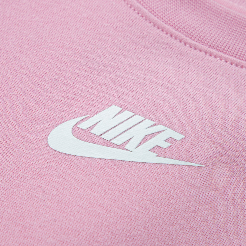 Light pink knit fabric with white Nike swoosh logo