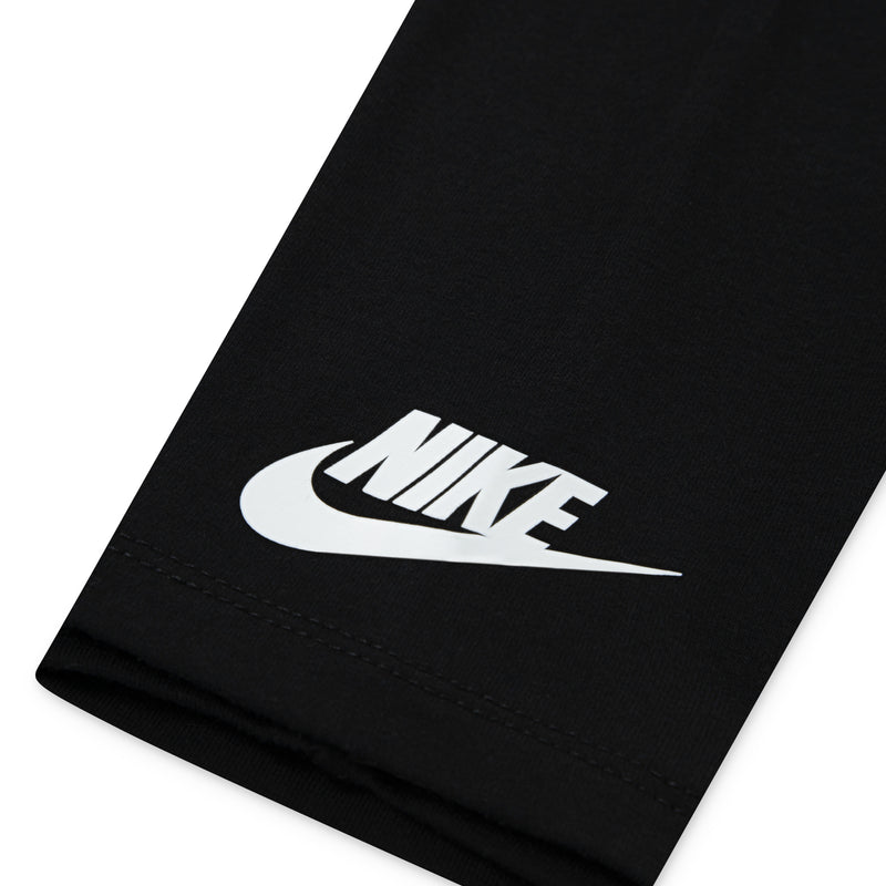 Black legging fabric with white Nike logo