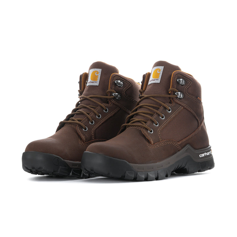 Pair of brown lace-up waterproof work boots with rugged soles, Carhartt logos