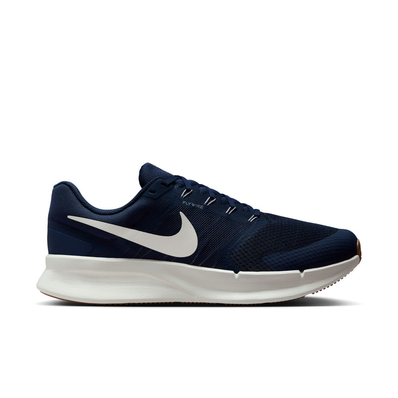Men's midnight navy running shoes with white swoosh and white midsole