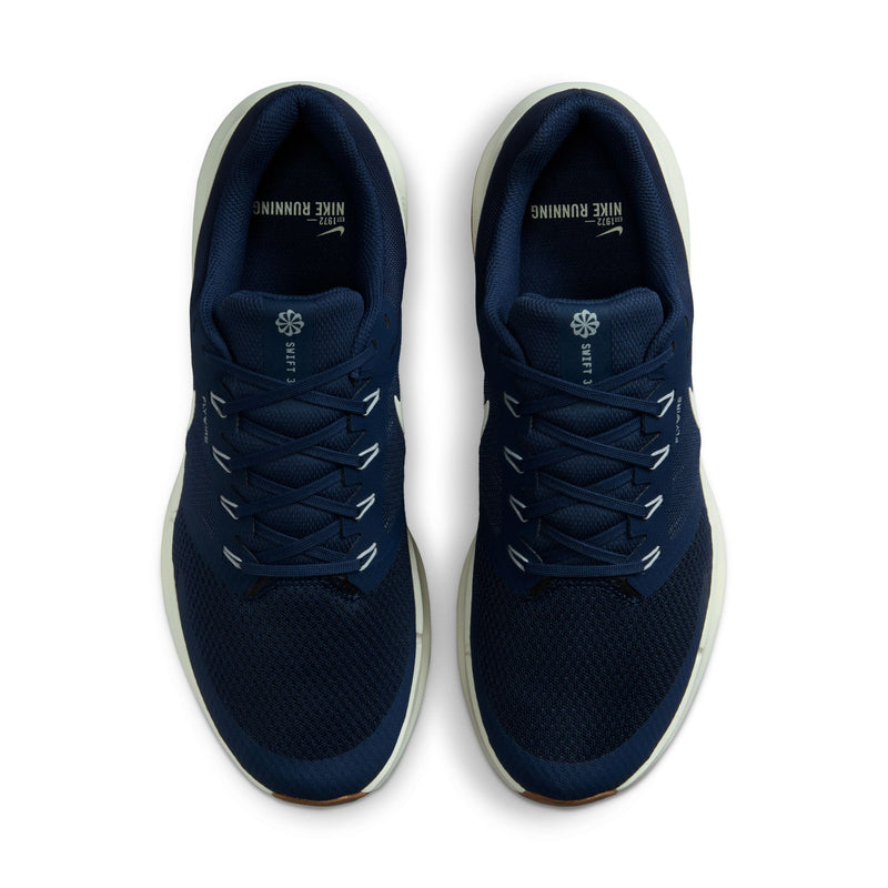 Pair of men's midnight navy lace-up running shoes, top view, textured knit