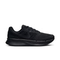 Black lace-up running shoe with swoosh logo and low-profile midsole