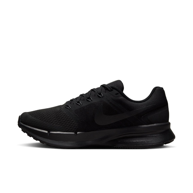Black running shoe side profile with swoosh logo and layered midsole