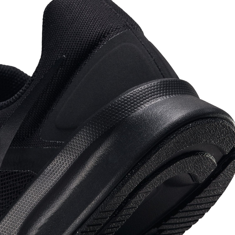 Black running shoe heel and rear cushion with textured midsole detail