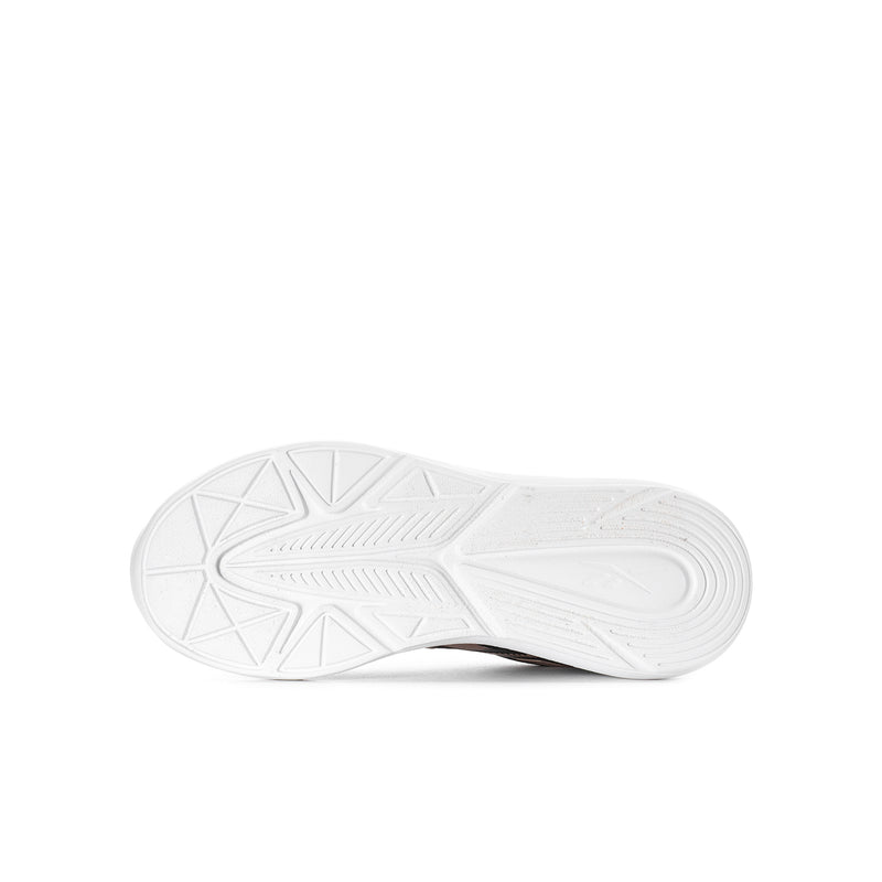 Youth running shoe outsole with white tread pattern