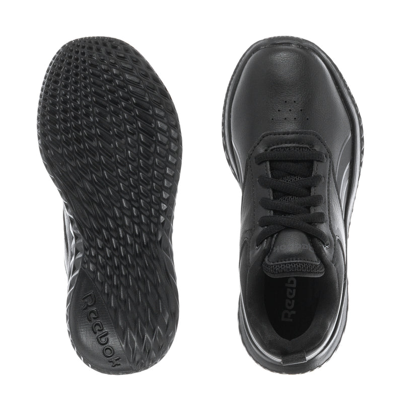 Black kids sneaker outsole tread and lace-up upper with Reebok label inside