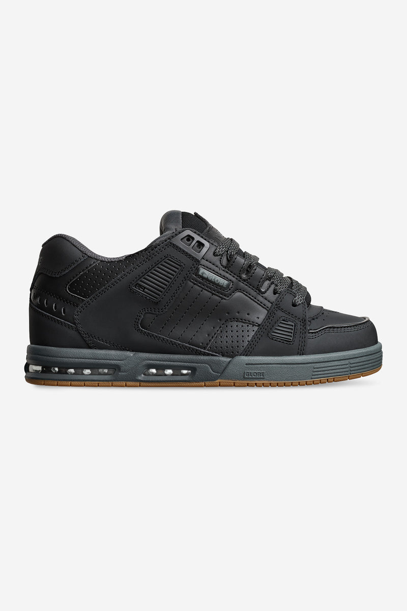Side view of Sabre Dark Shadow Phantom skate shoe in black with grey midsole and gum outsole.