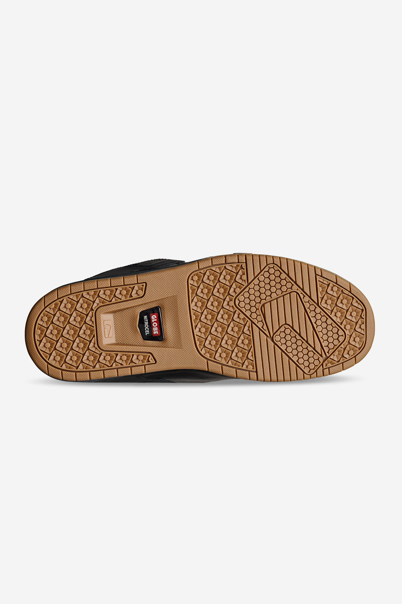 Bottom view of Globe Sabre skate shoe showing blue outsole and tan midsole with the Nitrocel pattern