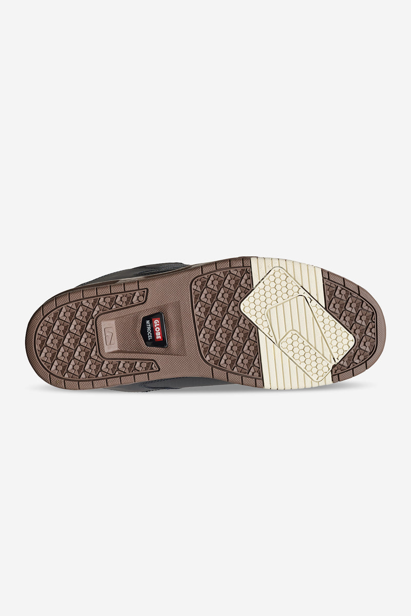 Outsole view of Sabre Lead Gum shoe with brown tread pattern and cream inserts.