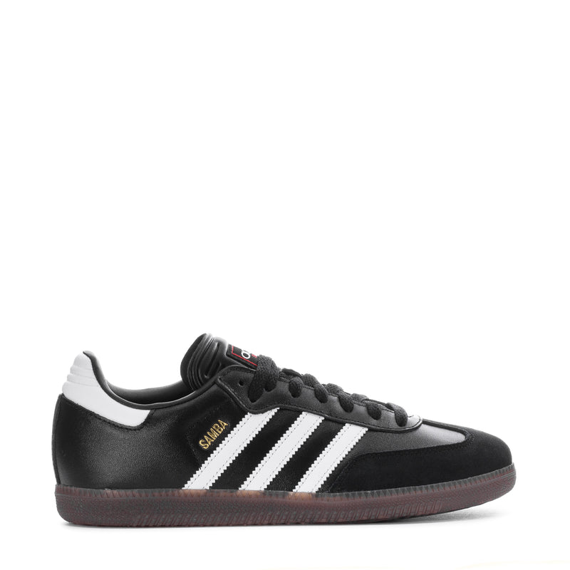 Youth adidas sneakers, black leather with white 3-stripe design and gum sole