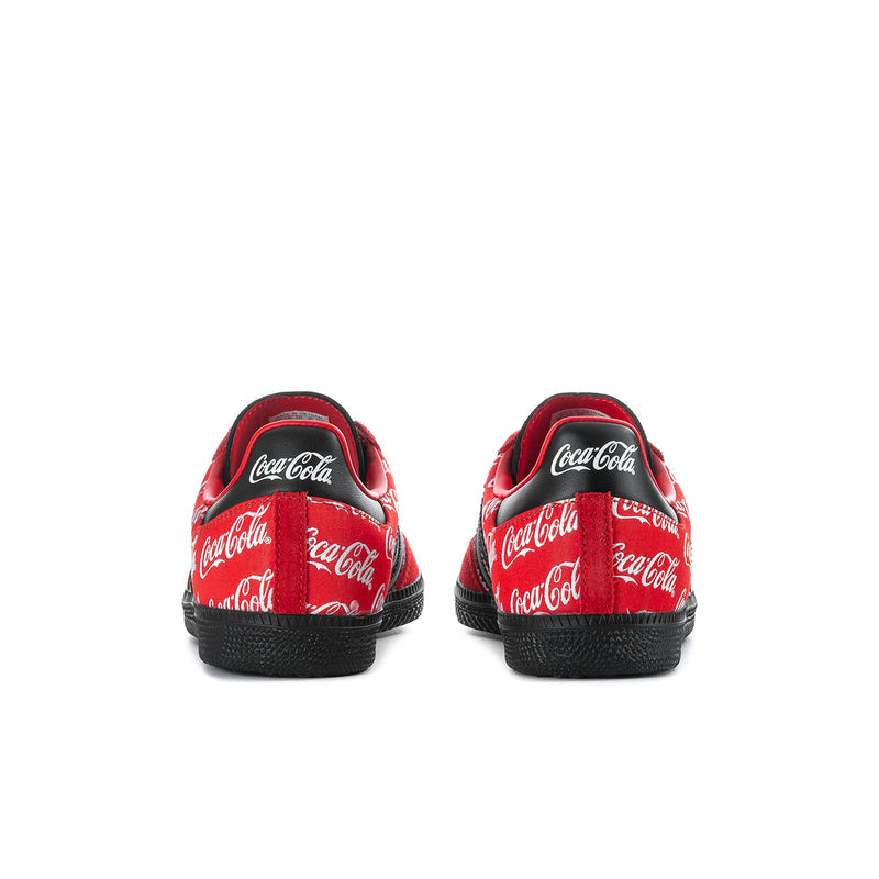 Red and black sneakers with Coca-Cola logo back panels and textured black heel