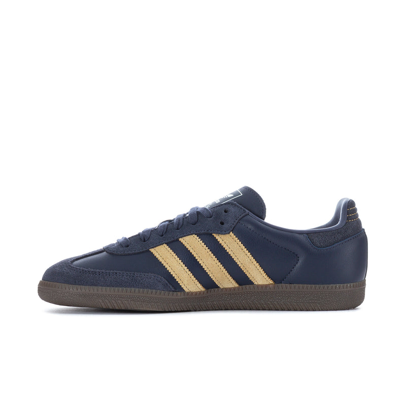 Navy men's low-top sneakers with gold three-stripe design and lace-up vamp