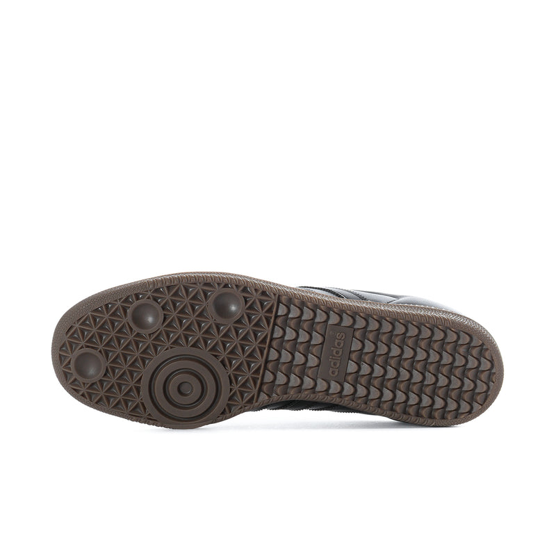 Outsole view of black adidas Samba OG sneaker with textured gum-brown rubber