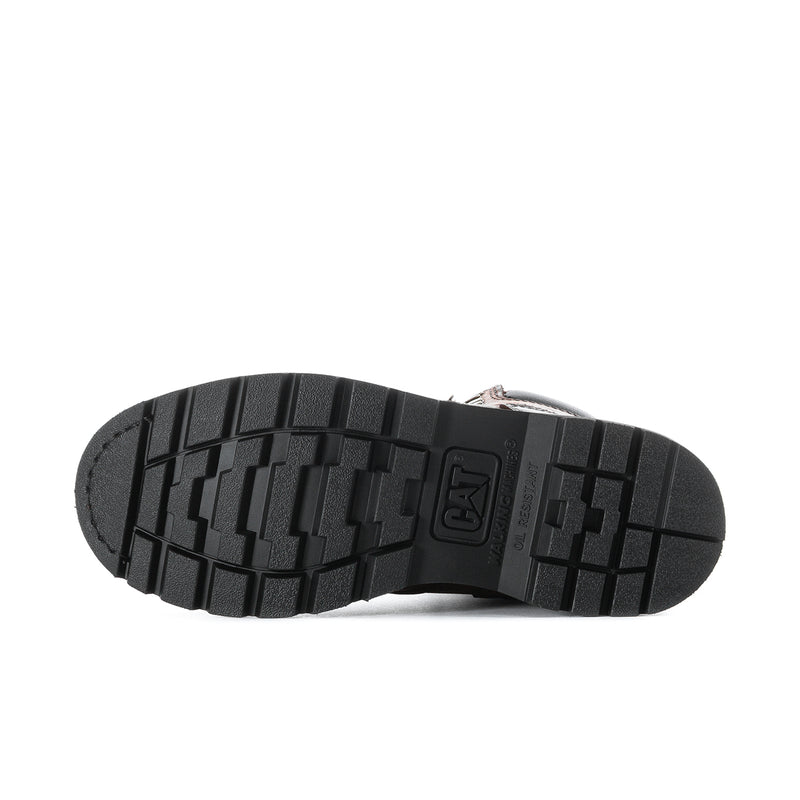 Black outsole of a work boot showing deep tread pattern for traction