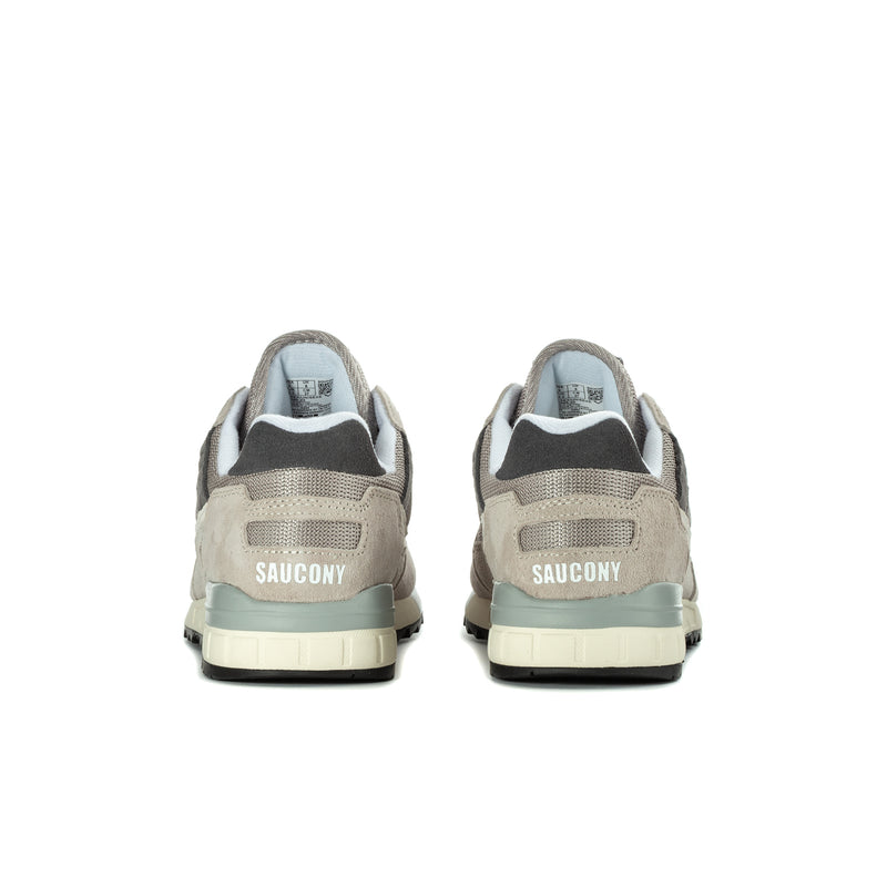 Men's Saucony running sneakers, rear view with teal-accent midsole