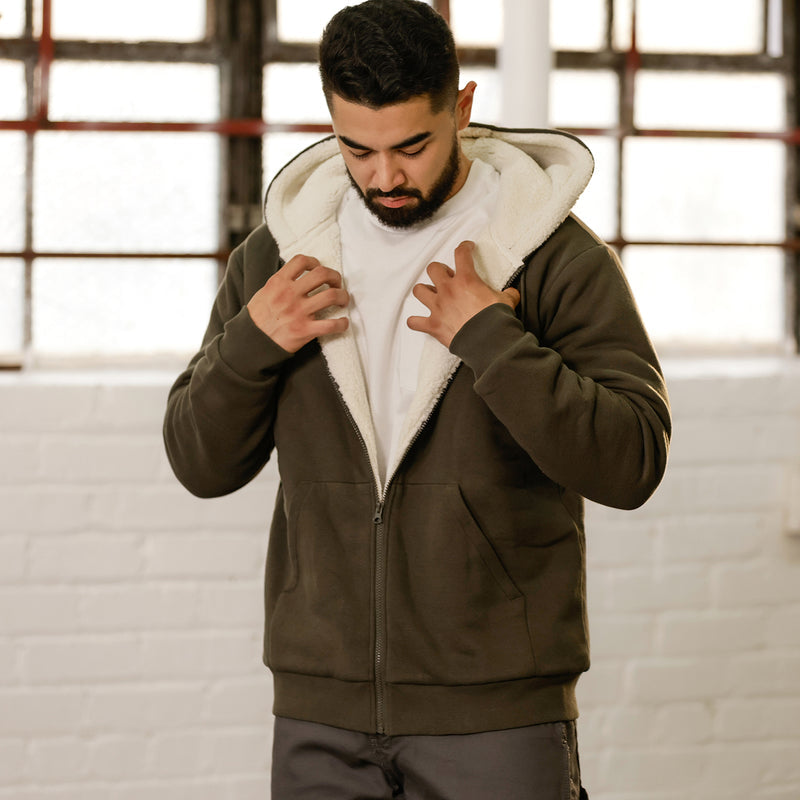 Men's olive sherpa-lined full-zip hoodie with visible sherpa hood lining