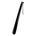 Black shoe horn with curved tip and hanging loop strap