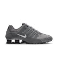 Men's dark gray lace-up sneakers with Nike swoosh and visible Shox cushioning pods