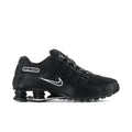 Men's black Nike sneakers with swoosh and Shox-style spring pods