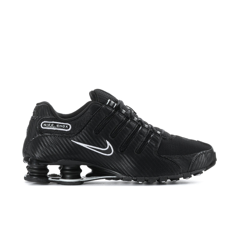Men's black Nike sneakers with swoosh and Shox-style spring pods